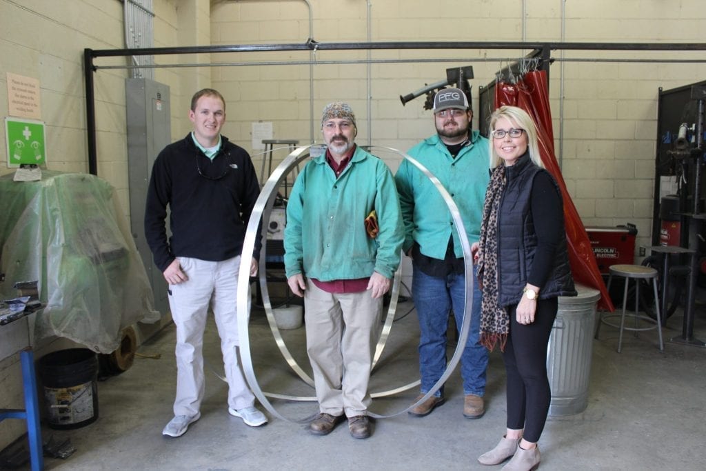 Pender County Parks and Rec Supervisor Zach White, welding instructor Al Meadowcroft, Welding student Joshua Roberts, and Pender County Tourism assistant Olivia Dawson.