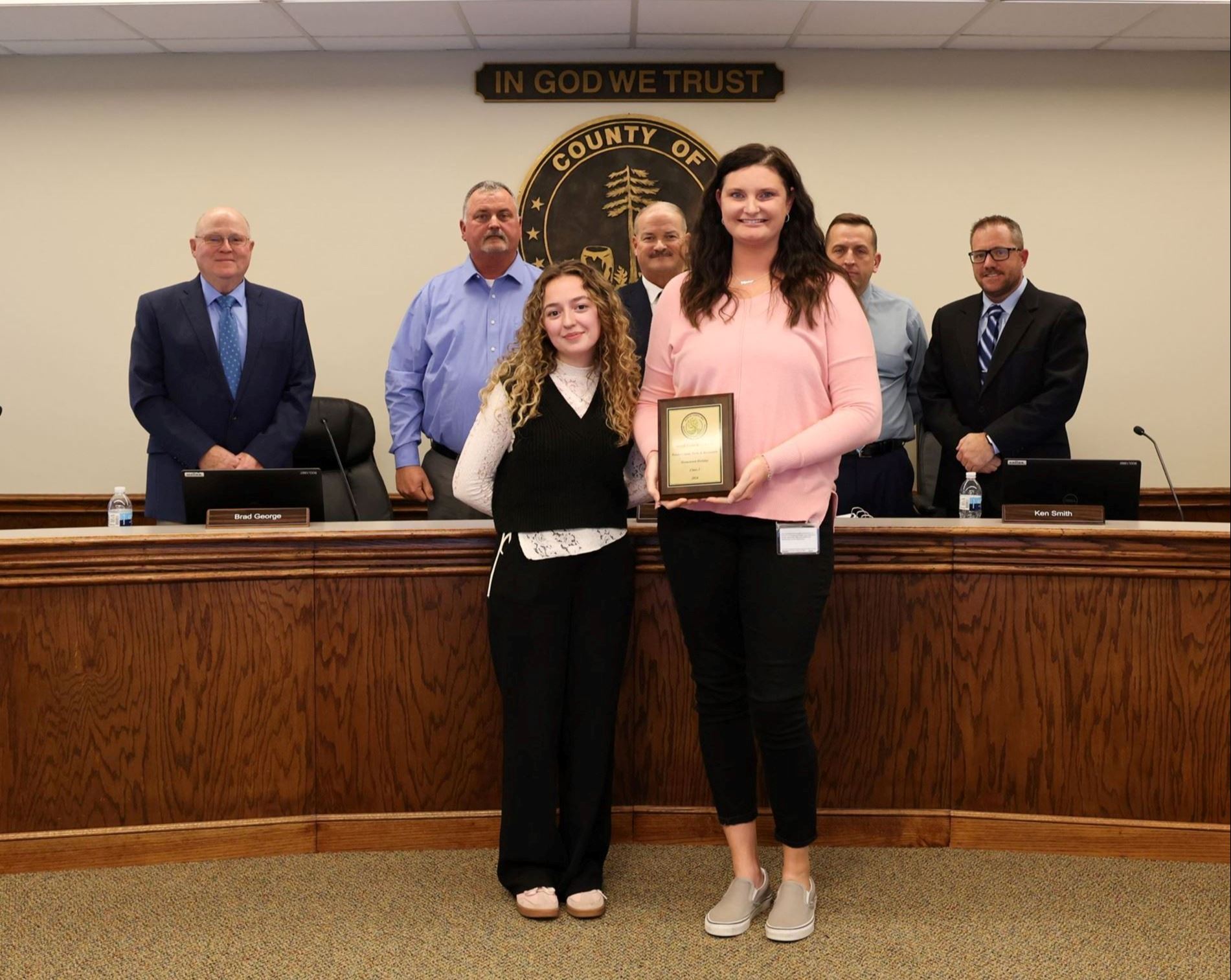 Theater award Jessica and Elizabeth Board members behind them